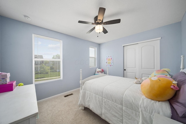 136 Bigelow Dr, Johnstown, OH 43031 - carpeted bedroom featuring a closet, baseboards, and ceiling fan