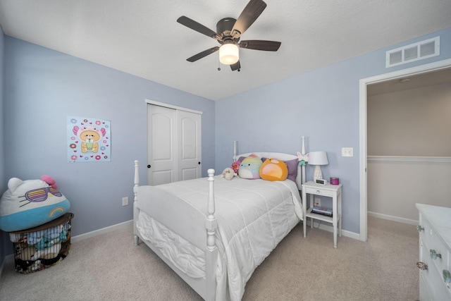 136 Bigelow Dr, Johnstown, OH 43031 - bedroom with light carpet, baseboards, a closet, and ceiling fan