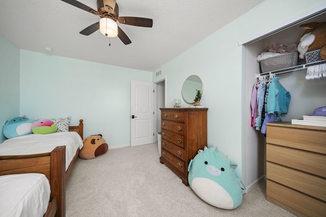 136 Bigelow Dr, Johnstown, OH 43031 - bedroom with light carpet, baseboards, and a ceiling fan