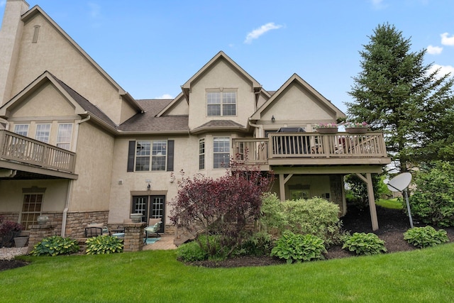 6755 Arbor View Ct, Powell, OH 43065 - rear view of house featuring stucco siding, a lawn, stone siding, and outdoor lounge area