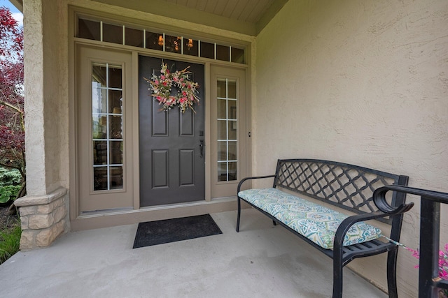 6755 Arbor View Ct, Powell, OH 43065 - property entrance featuring stucco siding and covered porch