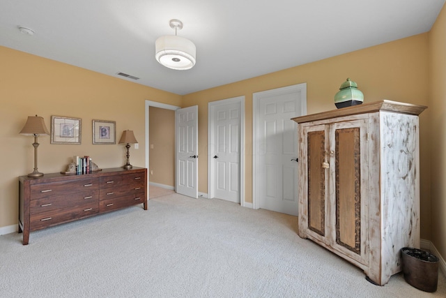 6755 Arbor View Ct, Powell, OH 43065 - bedroom featuring light colored carpet, baseboards, and multiple closets