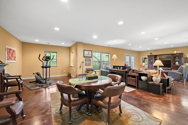 6755 Arbor View Ct, Powell, OH 43065 - dining space featuring finished concrete flooring, recessed lighting, baseboards, and french doors