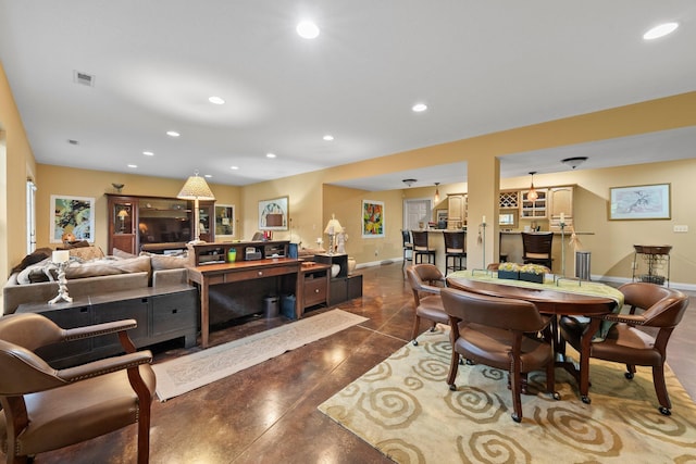 6755 Arbor View Ct, Powell, OH 43065 - dining area featuring baseboards, recessed lighting, and concrete flooring