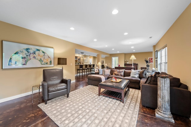 6755 Arbor View Ct, Powell, OH 43065 - living area featuring concrete flooring, baseboards, and recessed lighting