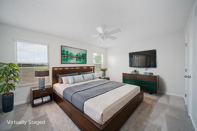1019 Wallace Dr, Delaware, OH 43015 - carpeted bedroom featuring baseboards and ceiling fan
