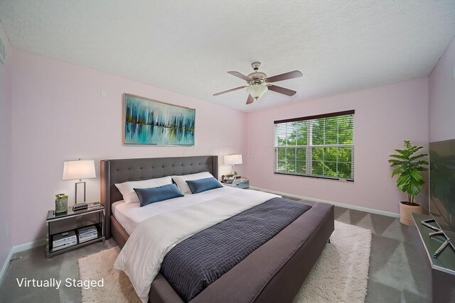 1019 Wallace Dr, Delaware, OH 43015 - carpeted bedroom featuring baseboards and a ceiling fan