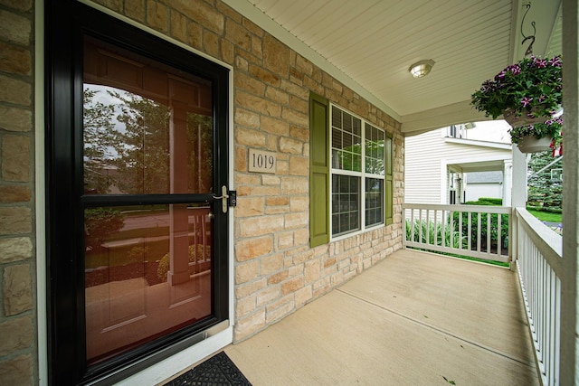 1019 Wallace Dr, Delaware, OH 43015 - entrance to property featuring covered porch and brick siding