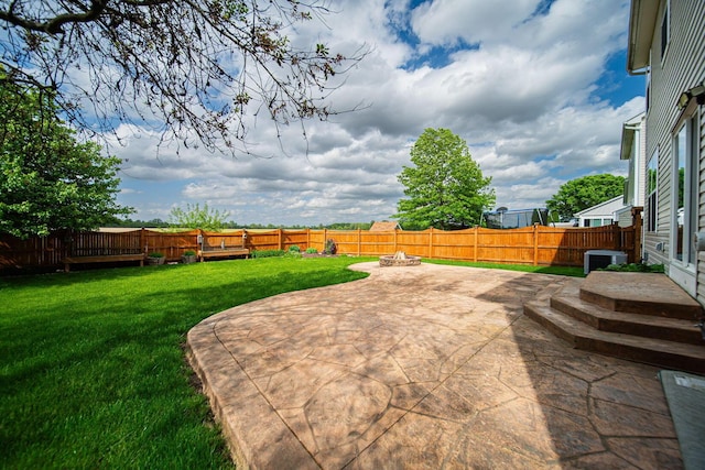 1019 Wallace Dr, Delaware, OH 43015 - view of yard with a patio area, central air condition unit, and a fire pit