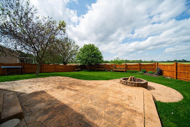 1019 Wallace Dr, Delaware, OH 43015 - view of patio / terrace with a fire pit