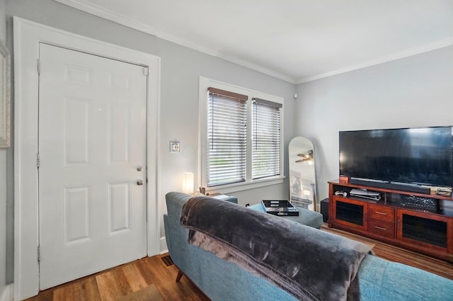 114 Roosevelt Dr, Springfield, OH 45504 - living area featuring wood finished floors and crown molding