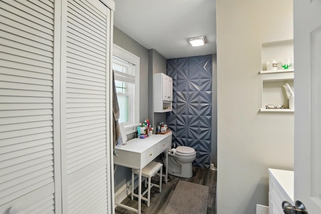 114 Roosevelt Dr, Springfield, OH 45504 - full bath featuring vanity, wood finished floors, toilet, and a shower