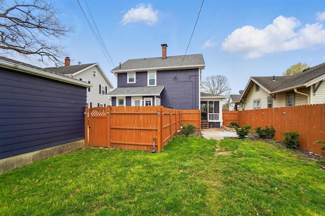 114 Roosevelt Dr, Springfield, OH 45504 - back of property with a sunroom
