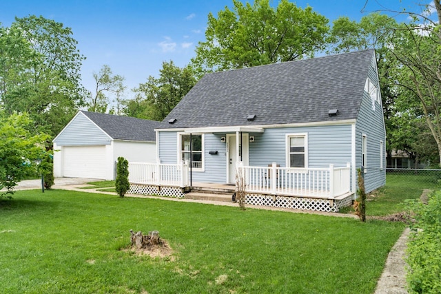 cape cod house with a shingled roof, a garage, and a deck
