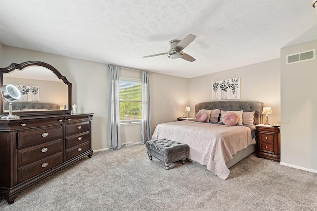 499 Wickham Way, Columbus, OH 43230 - bedroom featuring light colored carpet, baseboards, ceiling fan, and a textured ceiling