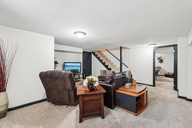 499 Wickham Way, Columbus, OH 43230 - carpeted living room featuring stairway and baseboards