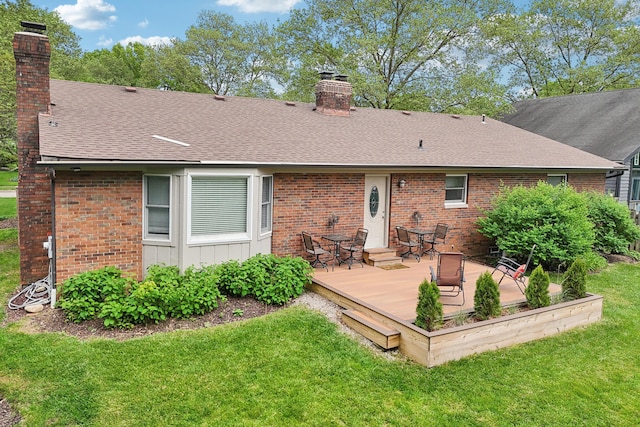 499 Wickham Way, Columbus, OH 43230 - rear view of property with a chimney, brick siding, roof with shingles, and a yard