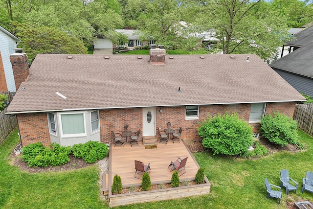 499 Wickham Way, Columbus, OH 43230 - back of property with a chimney, brick siding, a wooden deck, and a shingled roof