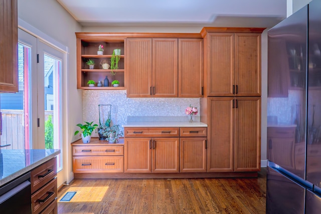 163 E 3rd Ave, Columbus, OH 43201 - kitchen featuring freestanding refrigerator, open shelves, light wood finished floors, and light stone counters