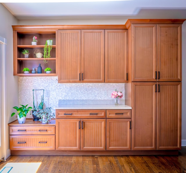 163 E 3rd Ave, Columbus, OH 43201 - kitchen with light countertops, open shelves, tasteful backsplash, and wood finished floors