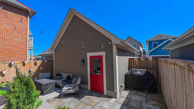 163 E 3rd Ave, Columbus, OH 43201 - back of house with a fenced backyard and a patio area