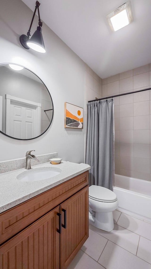163 E 3rd Ave, Columbus, OH 43201 - full bath with tile patterned flooring, vanity, toilet, and shower / bath combo