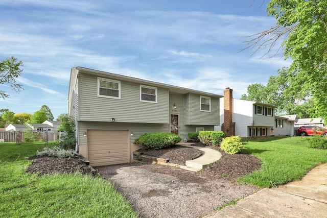 5756 Saffron Ave, Galloway, OH 43119 - raised ranch with an attached garage and driveway