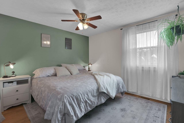 5756 Saffron Ave, Galloway, OH 43119 - bedroom featuring wood finished floors and a ceiling fan