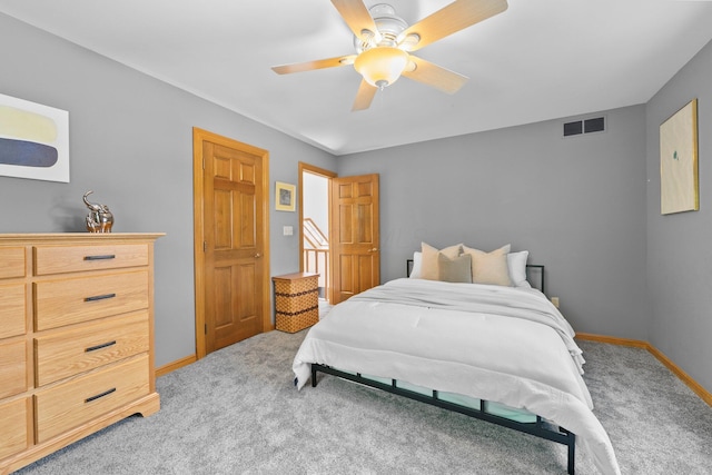 5657 Freeman Rd, Westerville, OH 43082 - bedroom with light carpet, baseboards, and ceiling fan