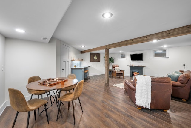429 N Old State Rd, Delaware, OH 43015 - dining space with dark wood-style floors, a lit fireplace, baseboards, and recessed lighting