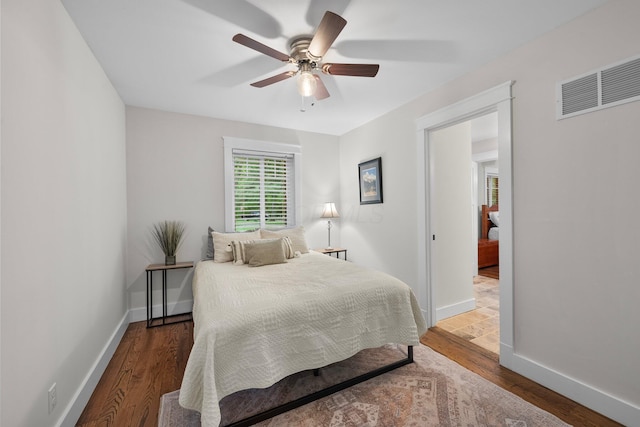 429 N Old State Rd, Delaware, OH 43015 - bedroom featuring baseboards, wood finished floors, and ceiling fan