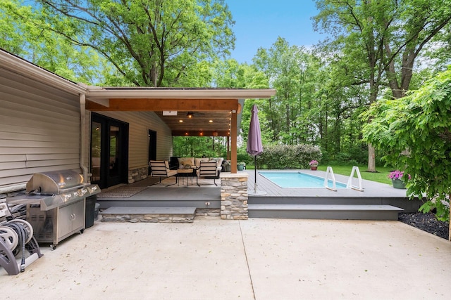 429 N Old State Rd, Delaware, OH 43015 - view of patio with outdoor lounge area, an outdoor pool, a grill, and a deck