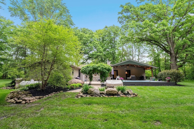 429 N Old State Rd, Delaware, OH 43015 - view of grassy yard featuring a patio area