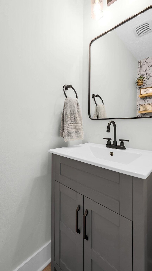 11600 Windridge Dr NW, Pickerington, OH 43147 - bathroom featuring vanity and baseboards