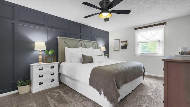 11600 Windridge Dr NW, Pickerington, OH 43147 - bedroom featuring dark colored carpet, baseboards, and a ceiling fan