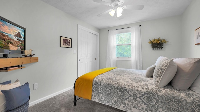 11600 Windridge Dr NW, Pickerington, OH 43147 - bedroom with carpet flooring, baseboards, a closet, ceiling fan, and a textured ceiling