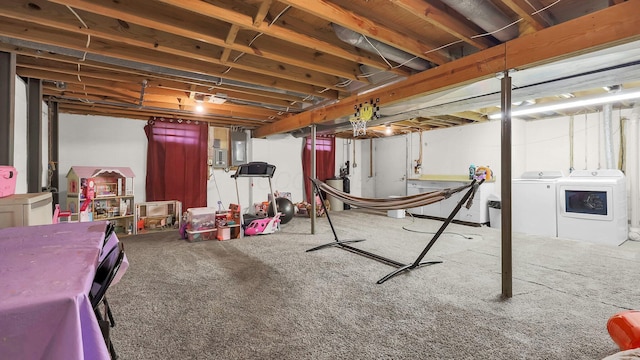 11600 Windridge Dr NW, Pickerington, OH 43147 - unfinished below grade area featuring washer and clothes dryer, electric panel, and carpet floors