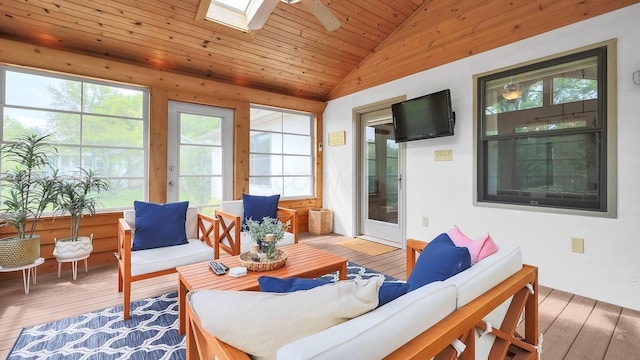 11600 Windridge Dr NW, Pickerington, OH 43147 - sunroom / solarium featuring lofted ceiling, a skylight, a deck, hardwood / wood-style flooring, and wood ceiling