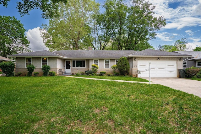2747 Castlewood Rd, Columbus, OH 43209 - single story home featuring a garage, driveway, a front lawn, a chimney, and brick siding