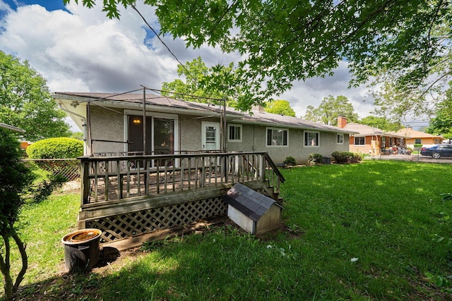 2747 Castlewood Rd, Columbus, OH 43209 - back of house with a wooden deck and stucco siding