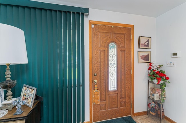 2747 Castlewood Rd, Columbus, OH 43209 - entryway featuring baseboards and tile patterned flooring