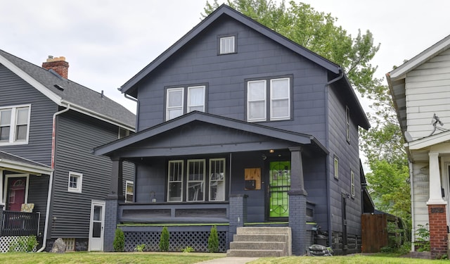 traditional style home with covered porch