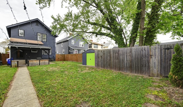 view of yard with a storage unit and an outdoor structure