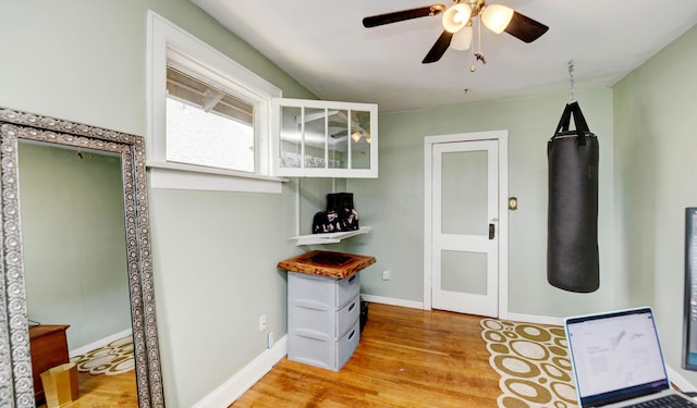 interior space with light wood-style flooring and baseboards