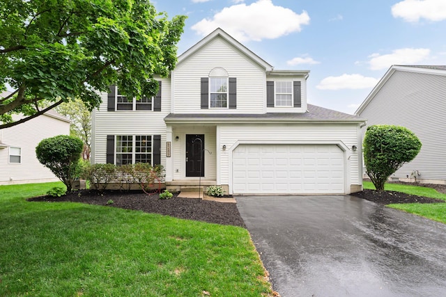 6289 Corley Dr, Dublin, OH 43016 - traditional-style home featuring asphalt driveway and a front yard