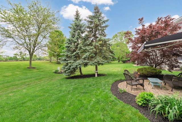 6289 Corley Dr, Dublin, OH 43016 - view of grassy yard featuring a patio area