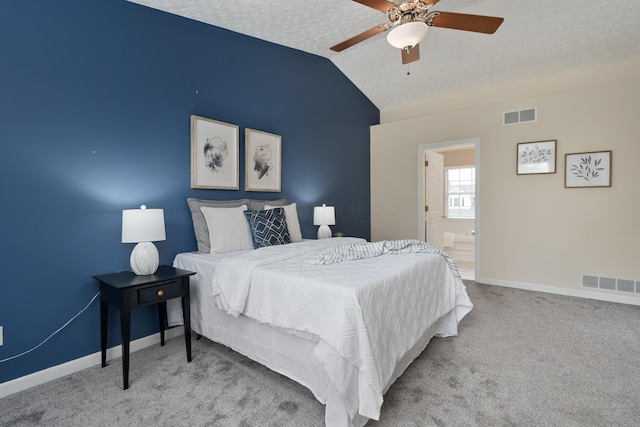 6289 Corley Dr, Dublin, OH 43016 - carpeted bedroom with vaulted ceiling, baseboards, a ceiling fan, a textured ceiling, and connected bathroom