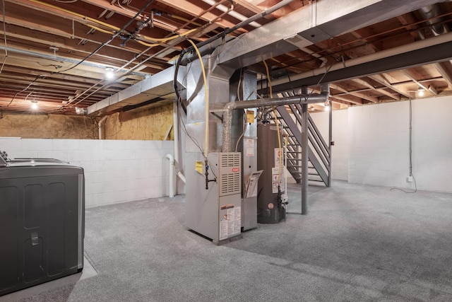 6289 Corley Dr, Dublin, OH 43016 - unfinished below grade area featuring water heater, heating unit, stairway, washing machine and clothes dryer, and concrete block wall