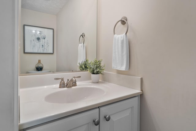 6289 Corley Dr, Dublin, OH 43016 - bathroom with vanity and a textured ceiling