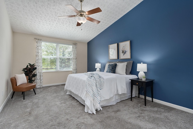 6289 Corley Dr, Dublin, OH 43016 - carpeted bedroom with vaulted ceiling, a textured ceiling, a ceiling fan, and baseboards